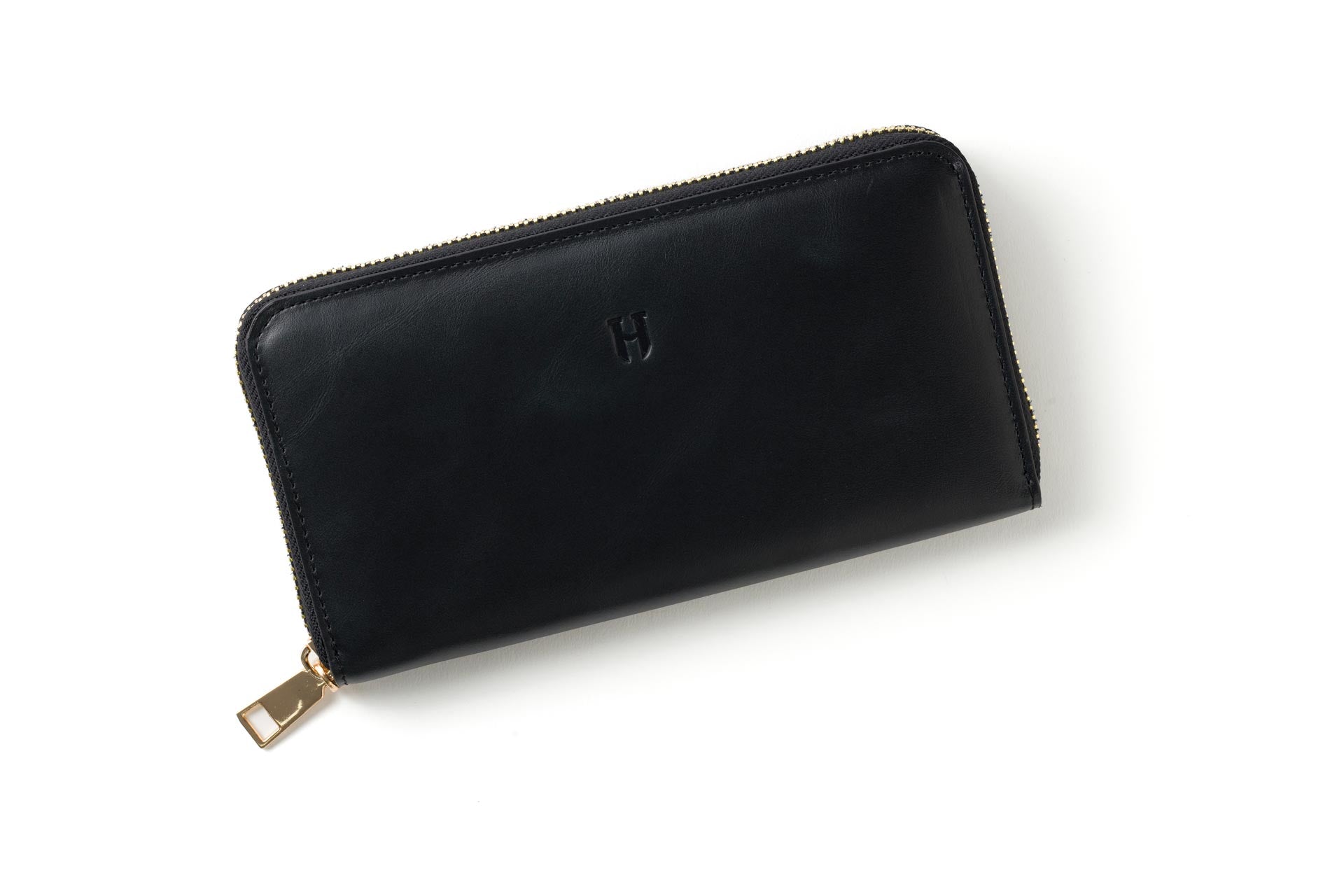 Hakiki deri, RFID korumalı fermuarlı kadın cüzdanı, şık ve güvenli.