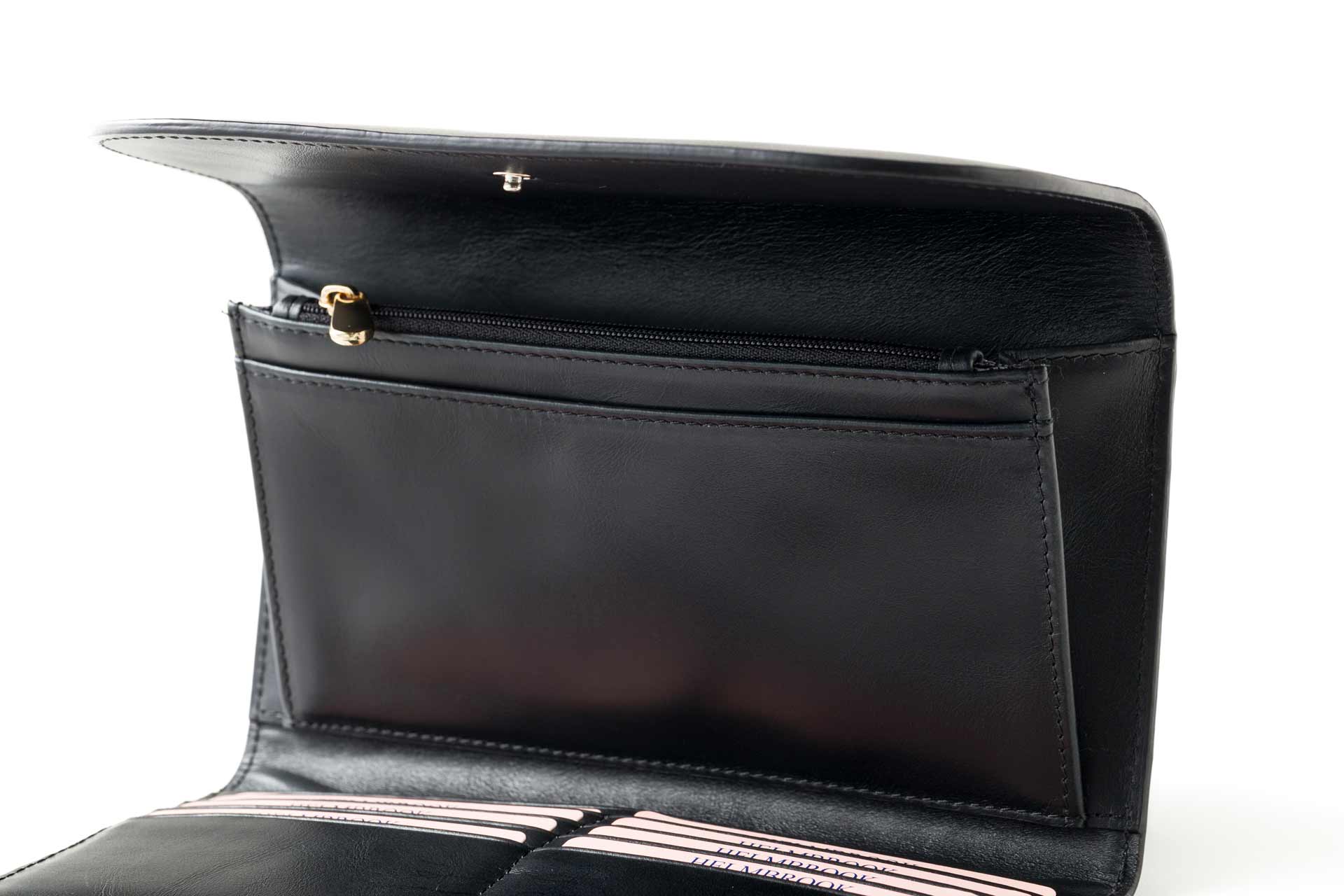 Lüks kadın fermuarlı hakiki deri RFID korumalı cüzdan, şık ve güvenli.