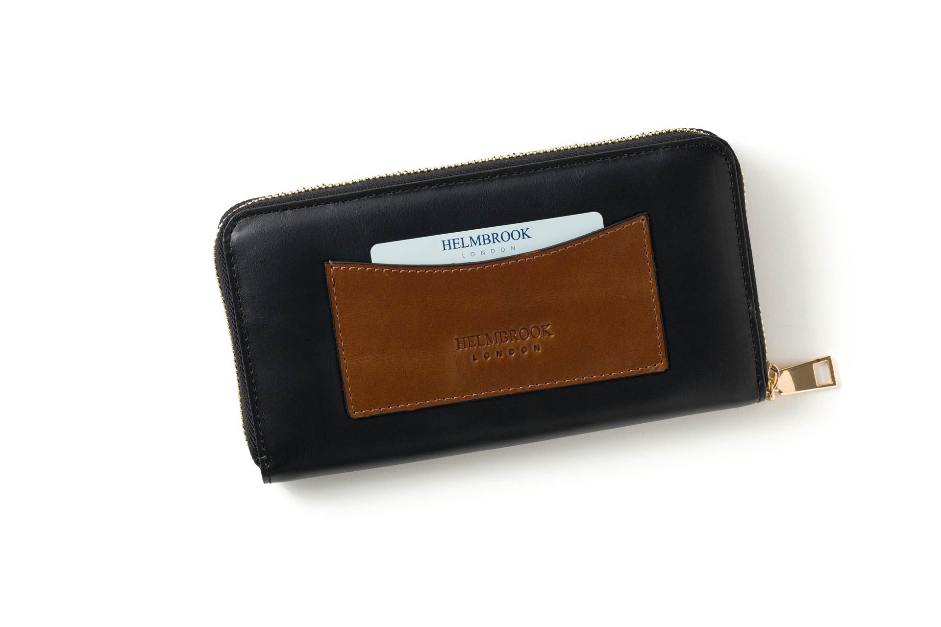 RFID korumalı kadın cüzdanı, el yapımı deri işçiliğiyle şıklığı ve güvenliği birleştiriyor.