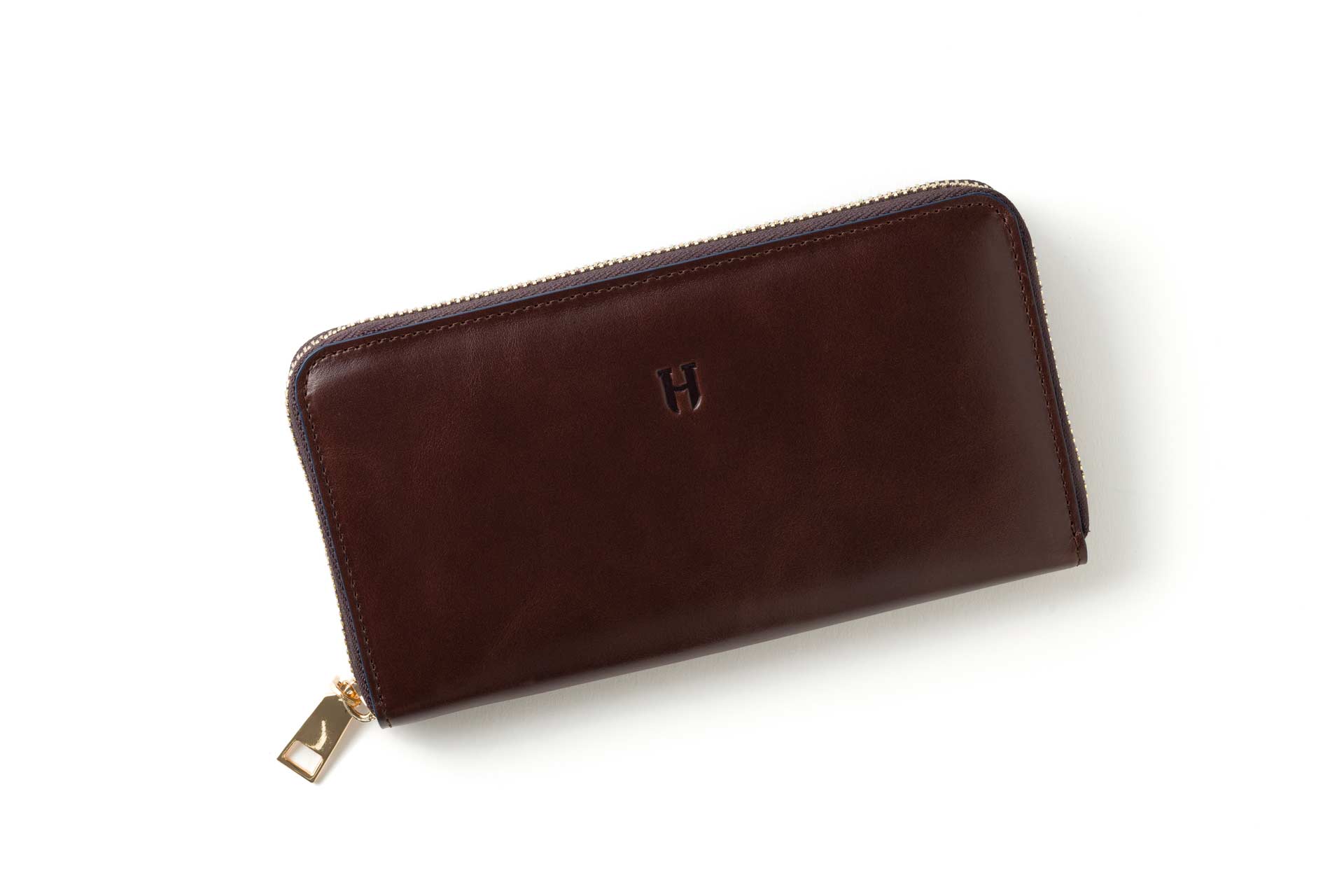 El yapımı deri, RFID korumalı fermuarlı kadın cüzdanı, zarif ve güvenli.